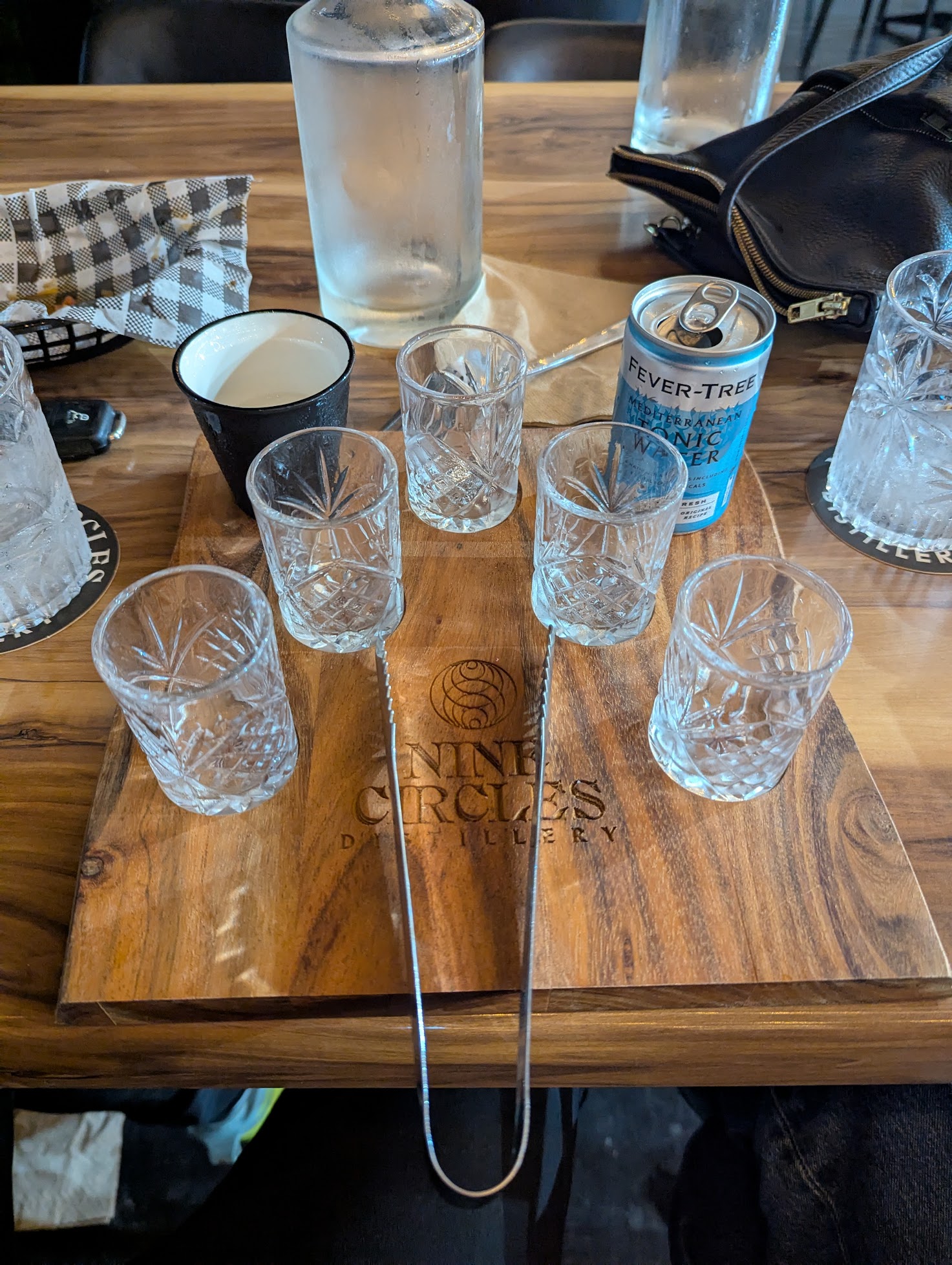 Tasting paddle of spirits from Nine Circles Distillery